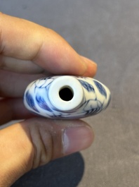 Two Chinese blue, white and copper-red snuff bottles and a blue and white 'crab' snuff bottle, Chenghua and Qianlong mark, 19th C.