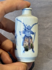 Four Chinese blue, white and copper-red snuff bottles, Yongzheng and Daoguang mark, 19th C.