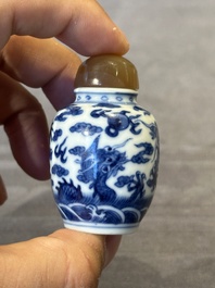Three Chinese blue and white 'dragon' snuff bottles, 19th C.