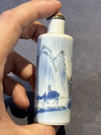 Three Chinese blue, white and copper-red snuff bottles and a blue and white snuff bottle, Qianlong mark, 19th C.