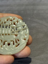 Two Chinese round jade plaques on carved wooden stands, 19th C.