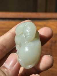 A Chinese white jade carving of a reclining camel, Qing