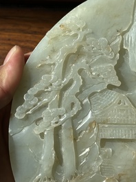 A Chinese celadon and russet jade plaque with landscape design, 19th C.