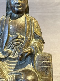 A rare Chinese parcel-gilt and lacquered pewter Guanyin, 17/18th C.