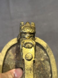 A pair of Chinese imperial gilt-bronze stirrups with dragons, De 德 mark, 18th C.
