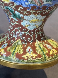 A Chinese Beijing enamel vase with floral design, 19/20th C.