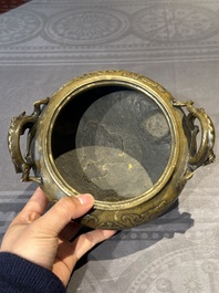 A Chinese imperial archaistic gold-splashed bronze censer and cover with chilong and 'shou' design, Xuande mark, 17th C.