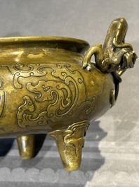 A Chinese imperial archaistic gold-splashed bronze censer and cover with chilong and 'shou' design, Xuande mark, 17th C.