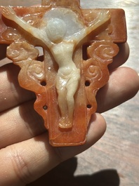 A Chinese white and red jade 'crucifix' pendant, 19th C.
