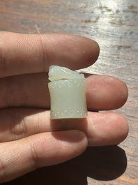 A Chinese white jade carving of a chilong reclining on bamboo, Qing