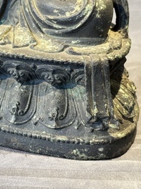 A large Chinese bronze sculpture of Bodhisattva on a lotus throne, Ming
