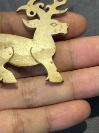 A rare Chinese calcified jade 'deer' pendant, Western Zhou