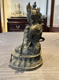 A large Chinese bronze sculpture of Bodhisattva on a lotus throne, Ming