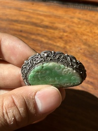 A Chinese jade 'dragon' plaque, a 'double-happiness' plaque and a jade inset silver brooch, 19th C.