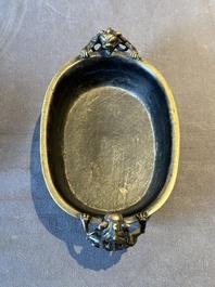 A rare Chinese bronze narcissus basin-shaped censer with dragon handles, Xuande mark, 17th C.