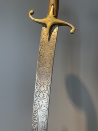 A silver plated dagger and four swords, China, Burma and Indonesia, 18/19th C.