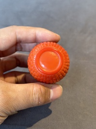 A Chinese coral-red Peking glass snuff bottle imitating a basket, 19th C.