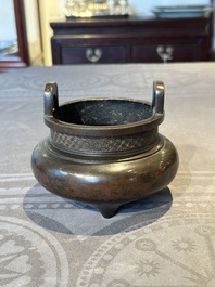 A Chinese bronze tripod censer, Ding 鼎 mark, Yuan/Ming