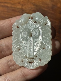 A Chinese white jade 'double phoenix' plaque, Qianlong mark and possibly of the period