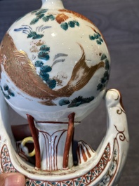 Two Chinese famille rose vases, two teapots and a Japanese wucai ewer, 19th C.