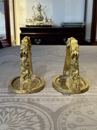 A pair of Chinese imperial gilt-bronze stirrups with dragons, De 德 mark, 18th C.