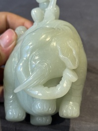 A Chinese celadon jade group of two boys cleansing an elephant, 18th C.