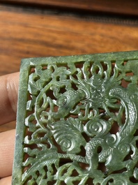A Chinese jade 'dragon' plaque, a 'double-happiness' plaque and a jade inset silver brooch, 19th C.