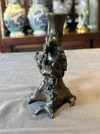 A Chinese bronze vase in the shape of a prunus, Ming