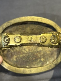 A pair of Chinese imperial gilt-bronze stirrups with dragons, De 德 mark, 18th C.