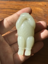 A Chinese white jade carving of a reclining boy, Qing
