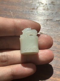 A Chinese white jade carving of a chilong reclining on bamboo, Qing