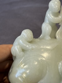 A Chinese celadon jade group of two boys cleansing an elephant, 18th C.