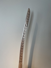 A silver plated dagger and four swords, China, Burma and Indonesia, 18/19th C.