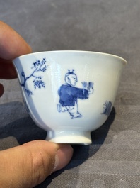 A Chinese blue and white 'Long Eliza and playing boy' cup and saucer, Qi Yu Mei Zhi 奇玉美製 and Bi Yu Tang Zhi 璧玉堂製, Kangxi