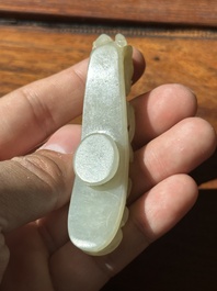 Two fine Chinese white jade carved belt hooks, Qing
