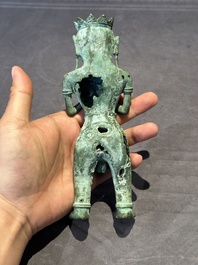 An fine Indonesian bronze sculpture of a naked man offering a sacrificial vase, Majapahit, East Java, 13/14th C.