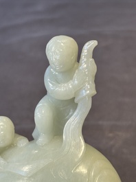 A Chinese celadon jade group of two boys cleansing an elephant, 18th C.