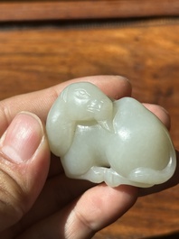 A Chinese white jade carving of a reclining camel, Qing
