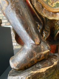 A large Japanese polychromed and gilt-lacquered wood figure of a divine general, Edo, dated 1623