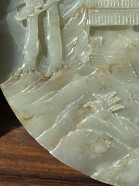 A Chinese celadon and russet jade plaque with landscape design, 19th C.