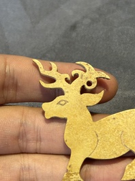 A rare Chinese calcified jade 'deer' pendant, Western Zhou