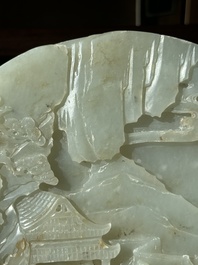 A Chinese celadon and russet jade plaque with landscape design, 19th C.