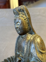 A rare Chinese parcel-gilt and lacquered pewter Guanyin, 17/18th C.