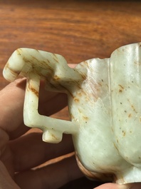 A Chinese celadon and russet jade wedding cup, 18th C.