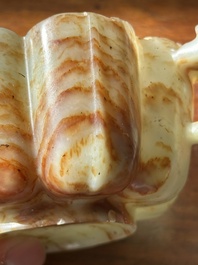 A Chinese celadon and russet jade wedding cup, 18th C.