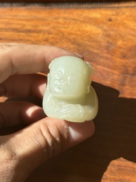 A Chinese white jade carving of a reclining boy, Qing