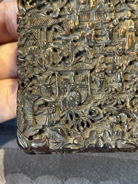 A Chinese jade carving, a tortoiseshell card holder and an iron-red snuff bottle, 19th C.
