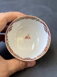 Four Chinese famille rose cups and saucers and an ewer with design of two horses, Qianlong