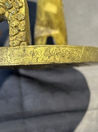 A pair of Chinese imperial gilt-bronze stirrups with dragons, De 德 mark, 18th C.