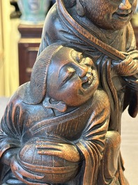 A large Chinese carved bamboo group of 'Hehe Erxian', 17th C.
